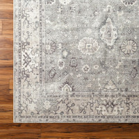 brown traditional rug closeup corner on wood floor