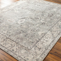 brown traditional rug in a room with matching decor