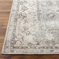 brown traditional rug closeup corner on wood floor