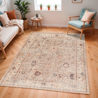 camel traditional rug in a room with matching decor