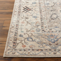 camel traditional rug closeup corner on wood floor