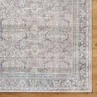silver traditional rug closeup corner on wood floor