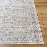 silver traditional rug closeup corner on wood floor