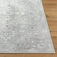 brown traditional rug closeup corner on wood floor