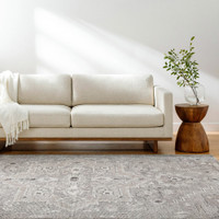 brown traditional rug in a room with matching decor