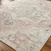 salmon traditional rug closeup corner on wood floor