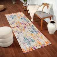 multicolour abstract rug in a room with matching decor
