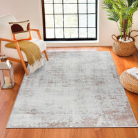 grey abstract rug in a room with matching decor