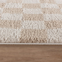 beige checker shaggy rug closeup detail