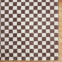 brown checker shaggy rug closeup corner on wood floor