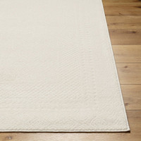 ivory off-white scandi rug closeup corner on wood floor