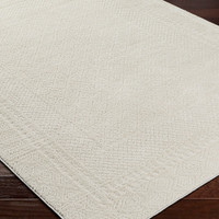 ivory off-white scandi rug closeup corner on wood floor