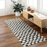 ivory black scandi rug in a room with matching decor