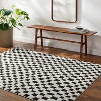 ivory black scandi rug in a room with matching decor