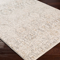ivory traditional rug closeup corner on wood floor
