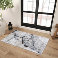 blue abstract rug in a room with matching decor