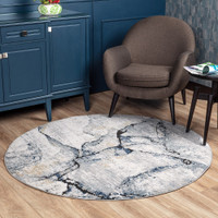 blue abstract rug in a room with matching decor