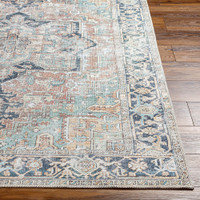 sage traditional rug closeup corner on wood floor