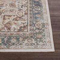 cinnamon traditional rug closeup corner on wood floor