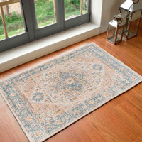 beige traditional rug in a room with matching decor
