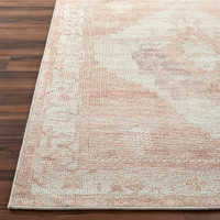blush traditional rug closeup corner on wood floor