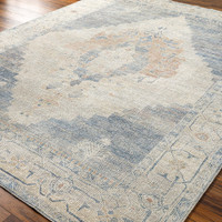 navy traditional rug closeup corner on wood floor