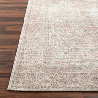 blush traditional rug closeup corner on wood floor