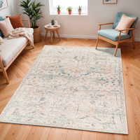 cream traditional rug in a room with matching decor