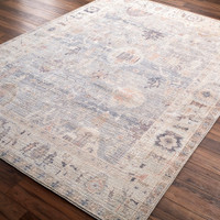 grey blue traditional rug closeup corner on wood floor