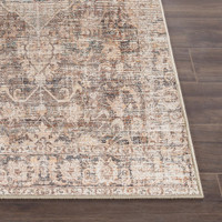taupe traditional rug closeup corner on wood floor