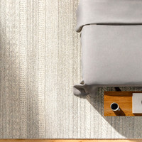 grey tribal wool rug in a room with matching decor