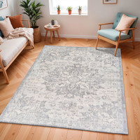 grey traditional rug in a room with matching decor
