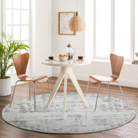 grey abstract rug in a room with matching decor