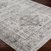 grey abstract rug closeup corner on wood floor