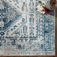 grey abstract rug closeup corner on wood floor