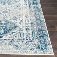 grey abstract rug closeup corner on wood floor
