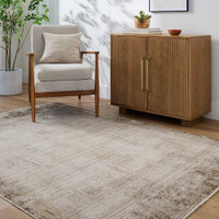 cream abstract rug in a room with matching decor