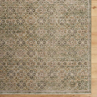 olive abstract rug closeup corner on wood floor