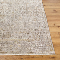 taupe abstract rug closeup corner on wood floor