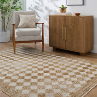mustard geometric rug in a room with matching decor