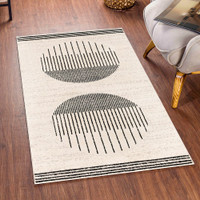 mono geometric rug in a room with matching decor