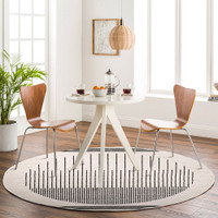 mono geometric rug in a room with matching decor