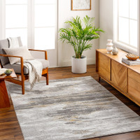 grey abstract rug in a room with matching decor