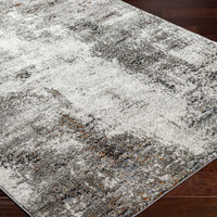 grey abstract rug closeup corner on wood floor