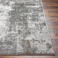grey abstract rug closeup corner on wood floor