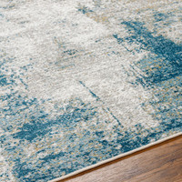 teal abstract rug closeup detail