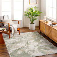 green abstract rug in a room with matching decor