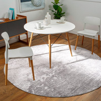 silver abstract rug in a room with matching decor
