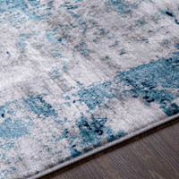 teal abstract rug closeup detail
