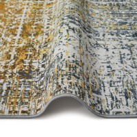 multicolour abstract rug partially folded